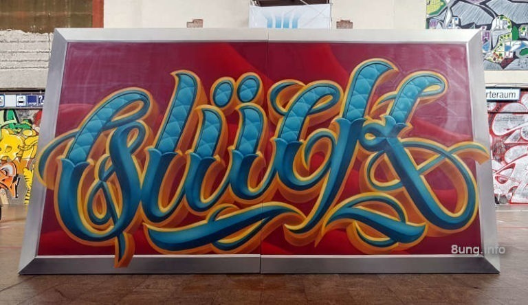 Graffiti im Bahnhof Stuttgart - 3d-Schrift Glück