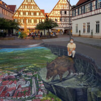 ♫ Strassenkunst – Kirchheim versinkt im tiefen Tal | 3D-Bild