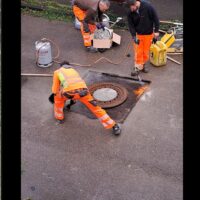 Kanaldeckel-Upgrade: Handwerker zeigen Meisterleistung
